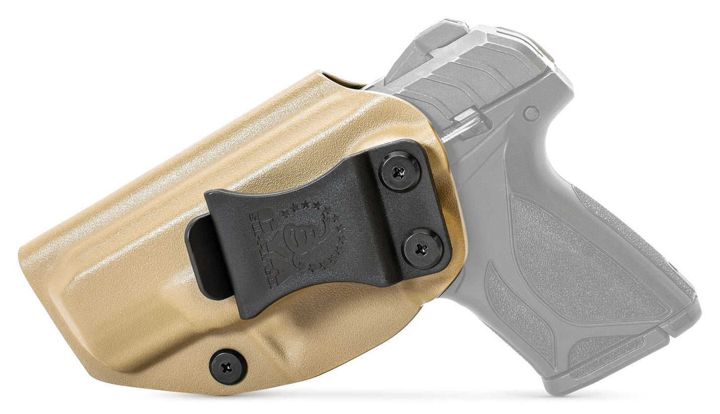 CYA Holster in flat dark earth with a black clip on a black Ruger Security-380 