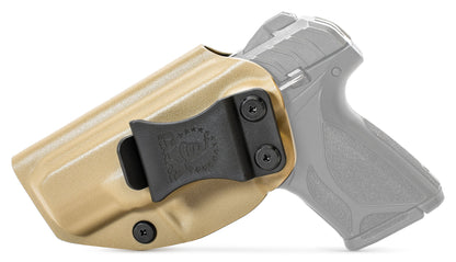 CYA Holster in flat dark earth with a black clip on a black ruger security 9 compact handgun