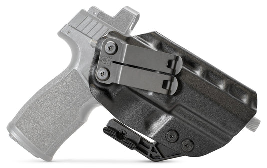 CYA Holster in black with a black clip on a black sig sauer p322 handgun